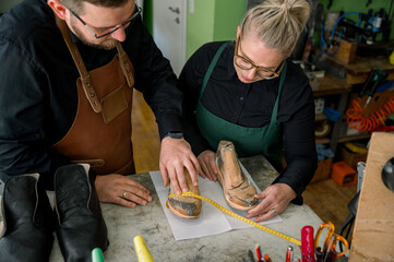 Austrian shoemakers crafting elegant footwear together