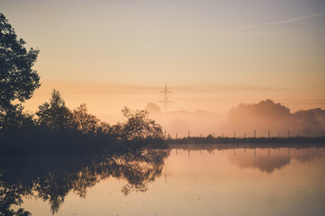 Misty morning at pond - 752606338