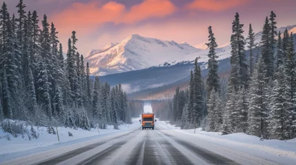 Foto op Plexiglas Truck driving on highway with snow mountain forest in winter. © Joyce