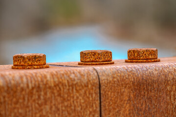 A row of very rusty fastening bolts have been out in the weather for decades on this span of bridge along the D&H Rail Trail in Forest City, PA. The shallow depth of field sets this image apart.