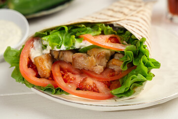 Tasty doner kebab on plate,  closeup