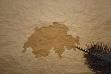 map of switzerland on a old paper background with old pen