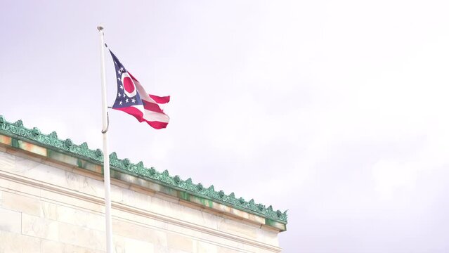 Ohio state flag blowing in the wind at a museum
