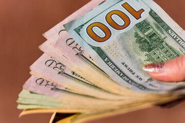 Obraz premium USD money banknotes, detail photo of US dollars