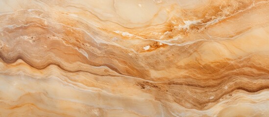 Obraz premium This close-up view showcases the intricate natural patterns and textures on a beige marble surface. The high definition shot captures the fine details of the marble, revealing its unique beauty up