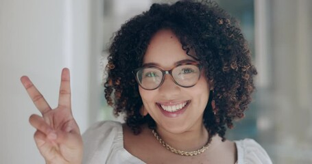 Office, peace sign and face of business woman with confidence, pride and positive attitude. Professional, creative consultant and portrait of worker for career, job and working in modern building