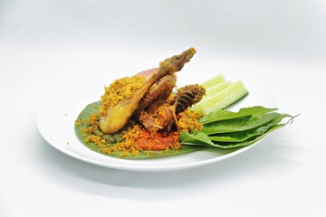 Ayam Goreng Kalasan, Indonesian food from Kalasan, Yogyakarta. It's fried chicken that cooked with special spice, combined with 'kremes', a crispy fried flour. Selective Focus