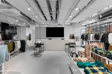  LED billboard or lightbox on glass panel at fashion clothes shop, Empty space for insert media advertisement