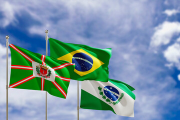 Official flags of the country Brazil, state of Parana and city of Curitiba. Swaying in the wind under the blue sky. 3d rendering