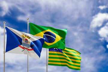 Official flags of the country Brazil, state of Piaui and city of Teresina. Swaying in the wind under the blue sky. 3d rendering