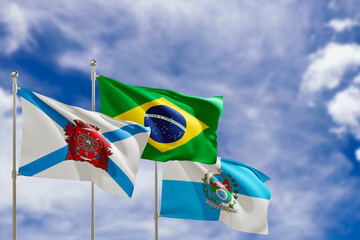 Official flags of the country Brazil, state of Rio Janeiro and city of Rio de Janeiro. Swaying in the wind under the blue sky. 3d rendering