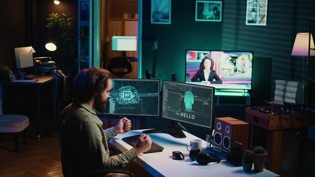Programmer being asked existential questions by awaken AI gaining consciousness, emulating humans, becoming self aware. Developer speaking with artificial intelligence on PC, camera B