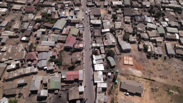 Aerial Over Poor African Urban Sprawl Tilt Down to Vertical