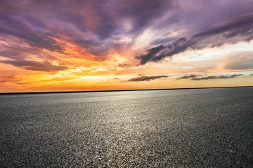 Foto op Aluminium Asphalt road and sky clouds at sunset © ABCDstock