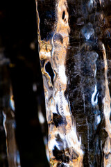 Patterns and colors inside icicles at Blackledge Falls in Connecticut.
