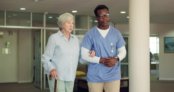 Elderly, woman and nurse with help for walking stick with conversation, medical support or assisted living. Senior, patient or professional caregiver with assistance, compassion in hospital or clinic