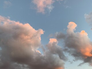 Pink clouds in the sky during sunset