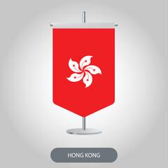 Hong Kong vertical table flag isolated on light grey background. Hongkong desk flag on barely white background.