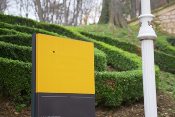 signpost with blank space for text in a park 