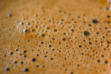 Closeup of hot coffee with bubble 