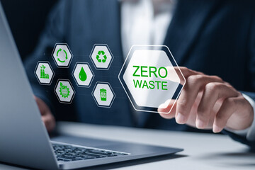 Zero waste concept. Reducing waste to zero, Ecological call for recycling and reuse, Sustainable lifestyle. Person use laptop with zero waste icon on virtual screen.