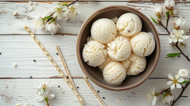 Vanilla ice cream bowls in a bowl decorated with flowers over a white wooden surface for text or product, Generative AI.
