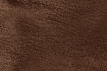 Dark brown leather texture background with seamless pattern and high resolution.