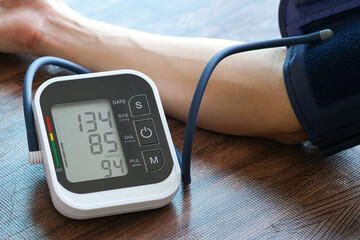 Doctor woman check blood pressure monitor and heart rate monitor pressure gauge. Health care and...
