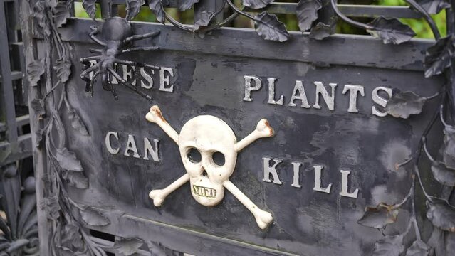 This Plants Can Kill Letters With Skull Crossbones Poison Sign, Alnwick Garden, England UK