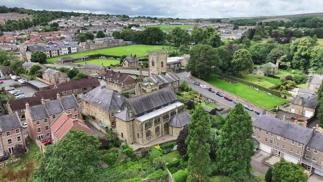 Drone Shot of St James' United Reformed Church and Pottergate Tower in Alnwick, England UK