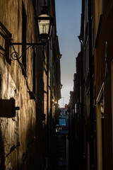 Stockholm, Sweden A narrow alley on Gamla Stan in the setting sun.