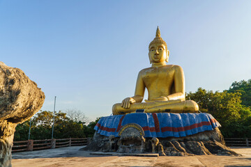 Golden seated big buddha statue in Thailand