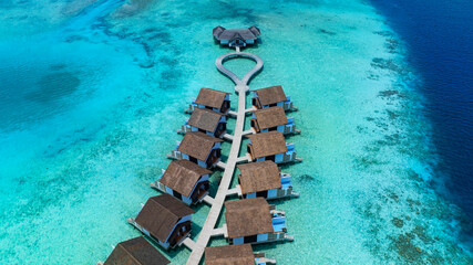 The Tropical aerial view with maldives paradise scenery seascape with water villas as amazing sea...
