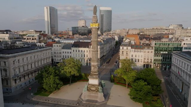 Aerial Drone above Landmark Colonne du Congres in Urban Brussels Park Belgium outdoors summer skyline in a squared plaza, establishing daylight location