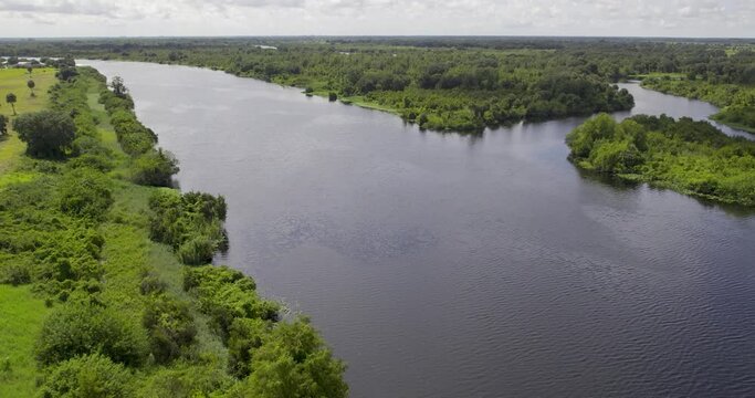 Aerial view of wide river in Florida that is connected to Lake Okeechobee
