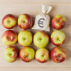 Euro money sack amidst apples arrangement - 752747589