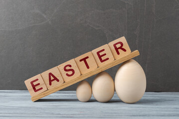 Easter Greetings: Wooden Blocks and Diverse Eggs - 752747797