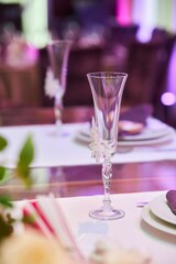 The decor at the celebration in the restaurant. Champagne glass