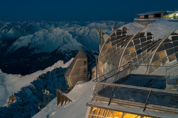 View from top of the Zugspitze across the whole alps mountain chain with snow at their peaks and...