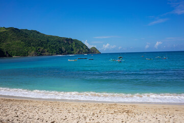 Pristine Mawun Beach in Lombok, Indonesia, Showcasing Unspoiled Sandy Shore and Crystal Clear Waters