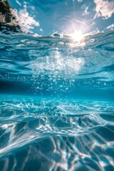 fotografía submarina del mar cristalino, rayos de sol bajo el agua, arena cielo y océano  - obrazy, fototapety, plakaty