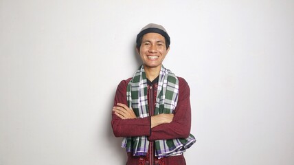 Asian Muslim man smiling and cool gestures