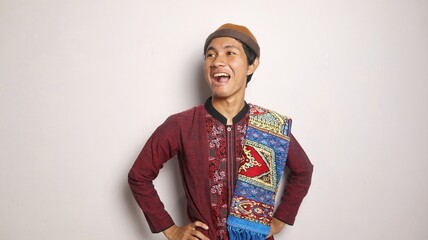Asian Muslim man smiling and cool gestures
