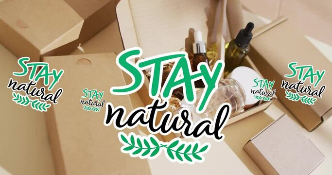 Animation of stay natural text repeated over organic beauty products in plain packaging