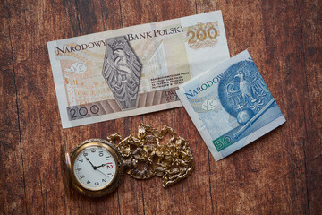 inflacja,polskie banknoty,zegarek kieszonkowy - obrazy, fototapety, plakaty