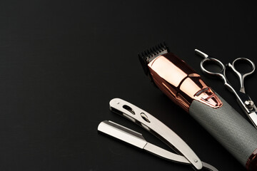 Tools for barbershop on black background studio shot