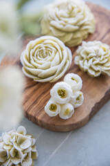 Decorative candles in the form of flowers