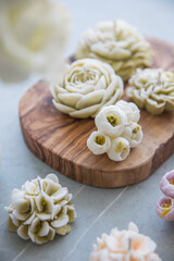 Decorative candles in the form of flowers
