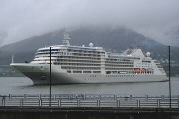 Super deluxe luxury cruiseship cruise ship liner yacht Muse arrival in Juneau, Alaska with...