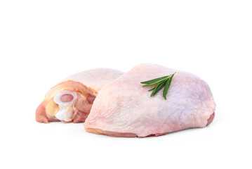 Raw chicken thigh with rosemary isolated on white background.